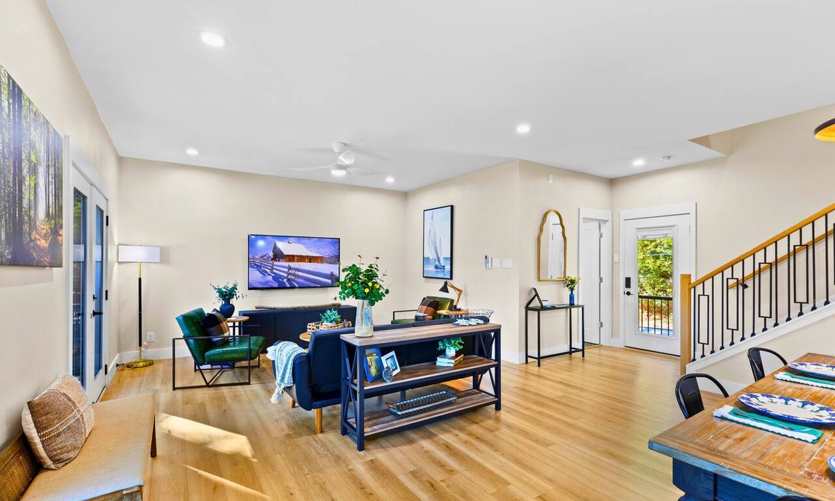 New Braunfels House | A unique Guadalupe River retreat featuring two stylish homes, private river access, a cozy fire pit, and a fun-filled game room—perfect for families, friends, and group getaways.