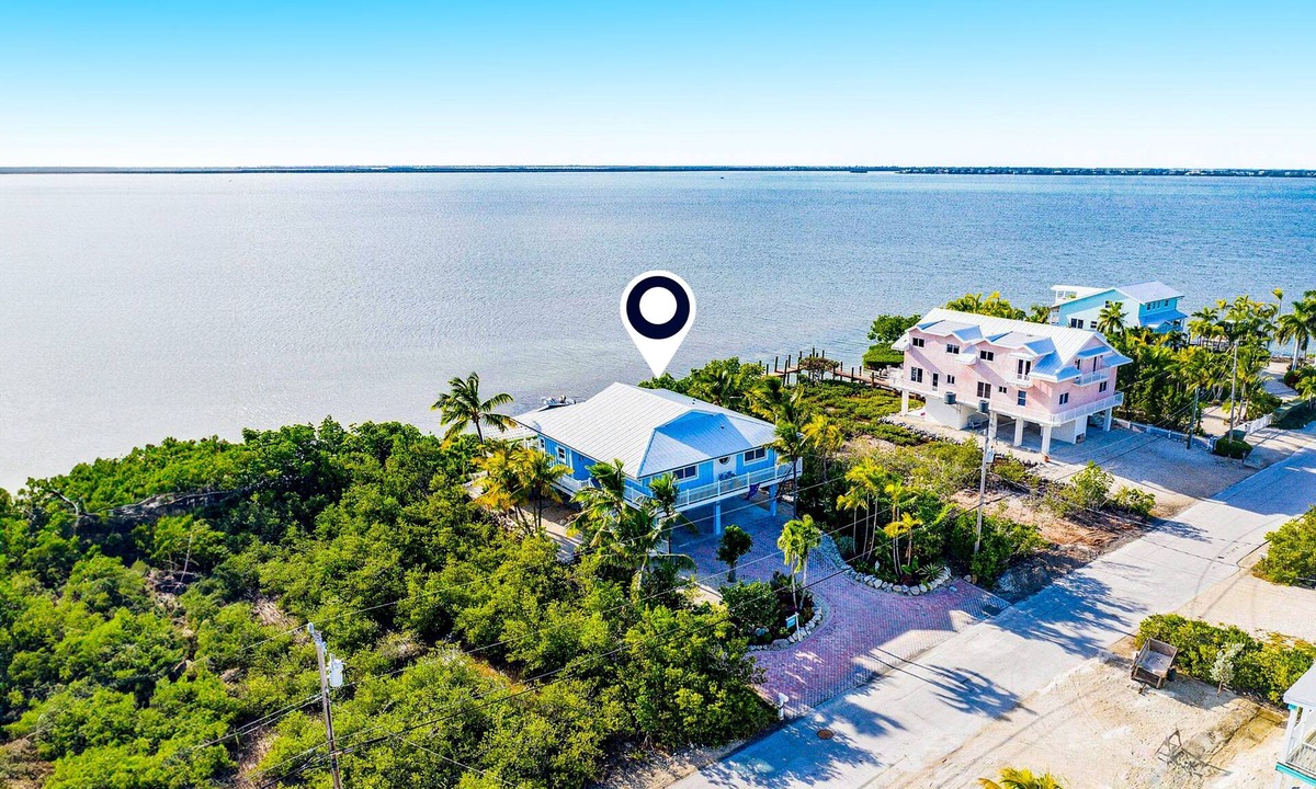 Cutthroat Harbor Estates House | Amazing waterfront home with private beach, dock, pool, WiFi & outdoor kitchen