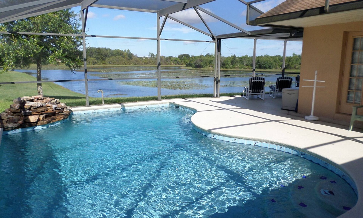 Orange Tree House | Antigua Lake View Villa with Peaceful Pool & Waterfall. Near Disney Free WiFi.
