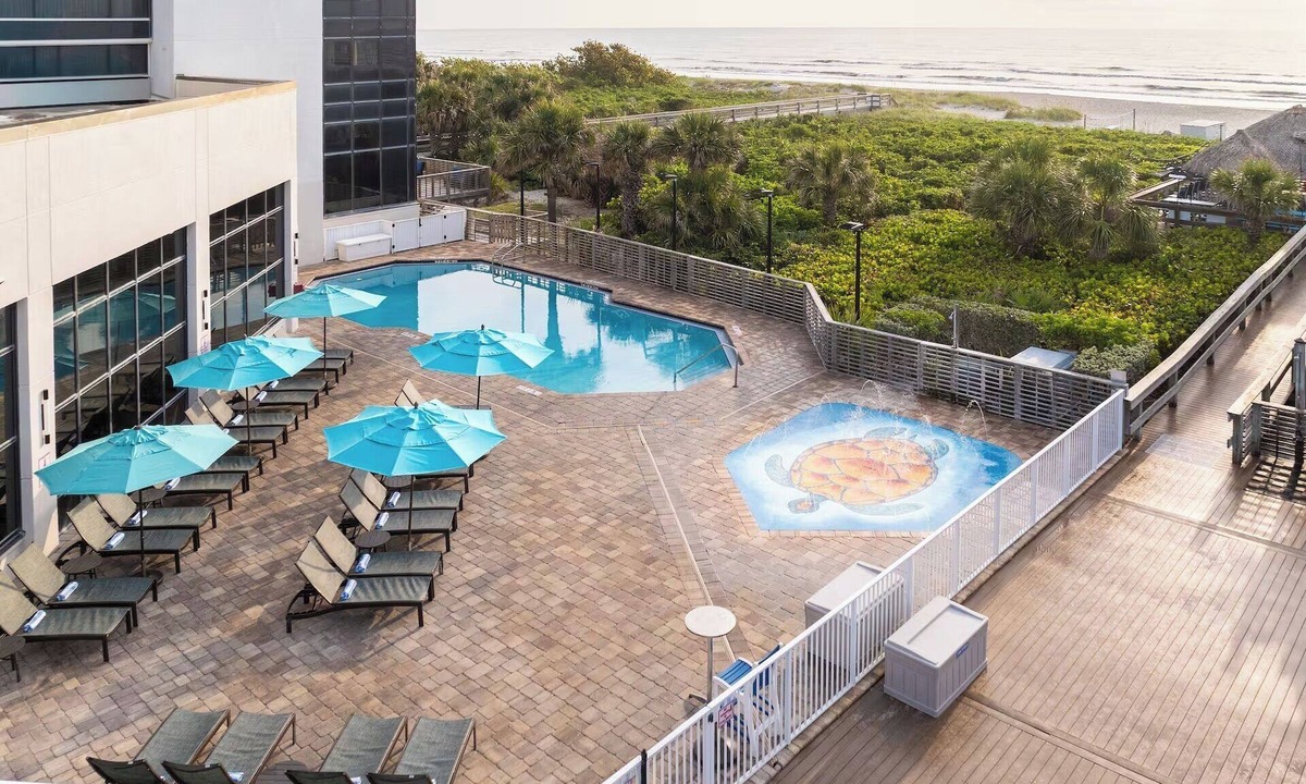 Cocoa Beach Hotel | Atlantic Coastline View | Outdoor Pool & Tiki Grill | 5 mi to Port Canaveral