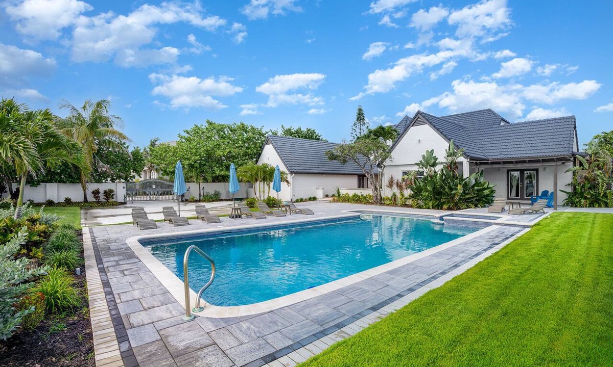Cocoa Beach House | Beach Front Home with Gated entry Large sparkling pool and private beach access