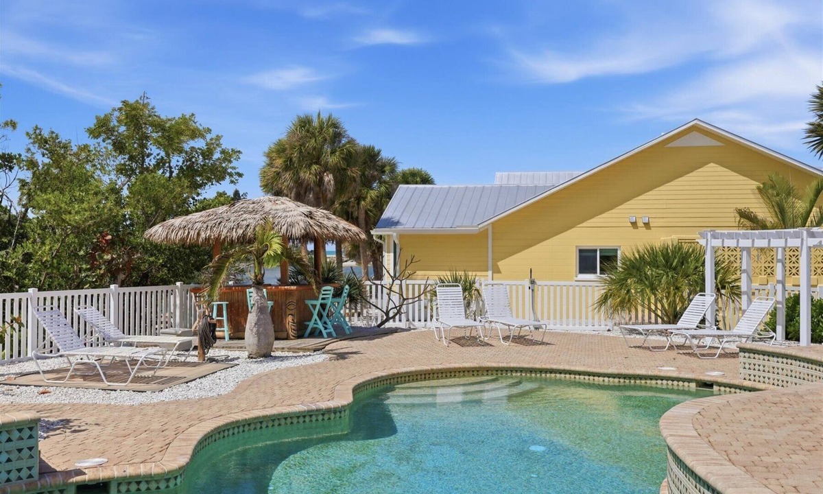 Palm Island House | Beautiful GROUND LEVEL Pool home, totally renovated .PET FRIENDLY!
