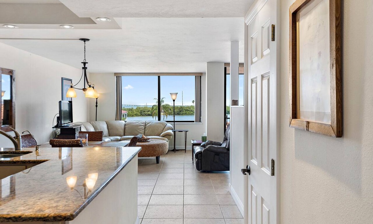 Isla del Sol Condo | Beautiful updated 3rd floor condo with open floor plan and lovely water views