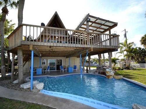 Grant-Valkaria Ski Chalet | Beautifully Decorated Waterfront Chalet Rental in Grant, Florida
