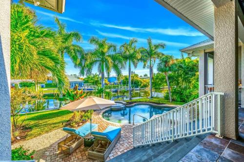 Anna Maria House | Bikini's & Martini's Waterfront Canal: 1 Block to Beach! Dock! On Canal! Anna Maria Life