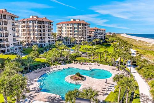 Fernandina Beach House | Bright & airy oceanfront condo with pool, huge balcony, washer/dryer & AC