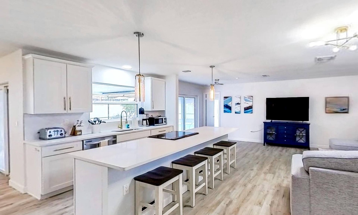Dunedin House | Bright and open home with private pool screened lanai enclosed yard and WD