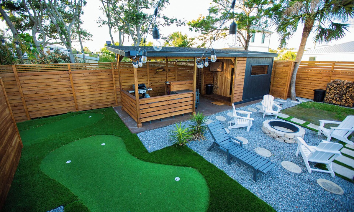 Butler Beach Cottage | Charming Cottage with Sauna, MINI Golf, 2 OD Showers, Fire-pit, Soaking Tub Dogs