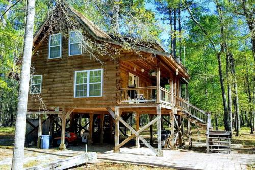 Claxton House | Claxton's Riverfront Family Fun: Cabin Adventures Await