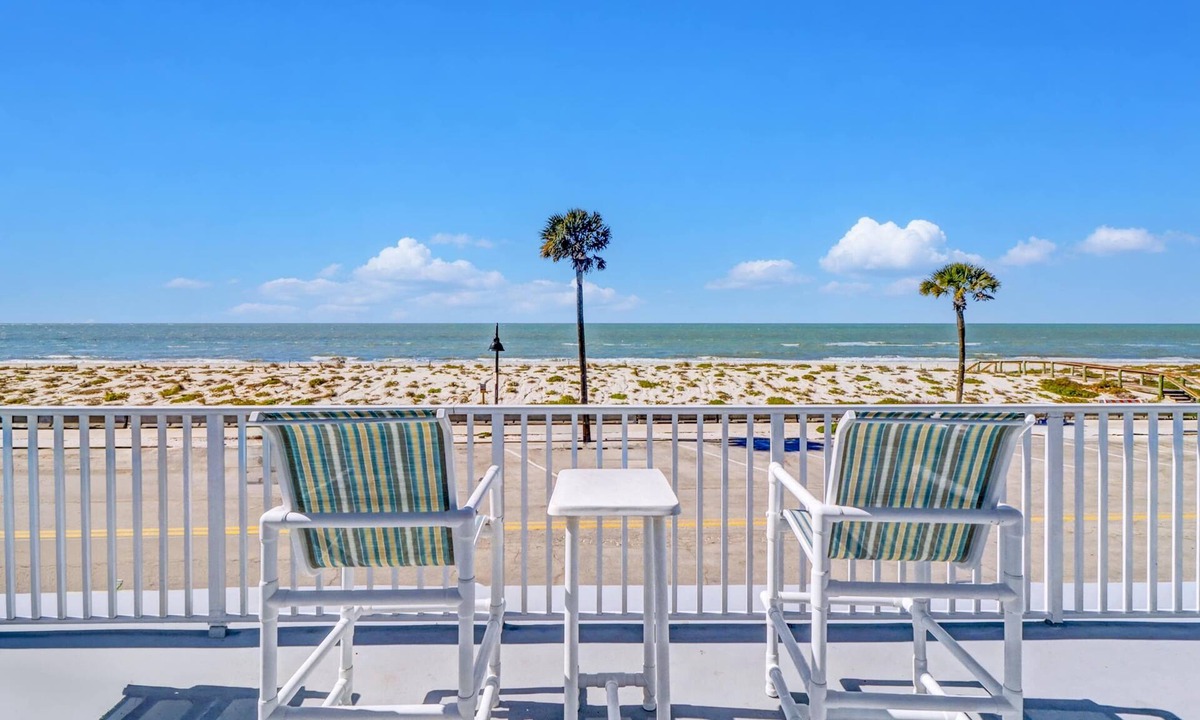Pass-a-Grille Historic District House | Coastal dog friendly condo with observation deck best Gulf sunset views
