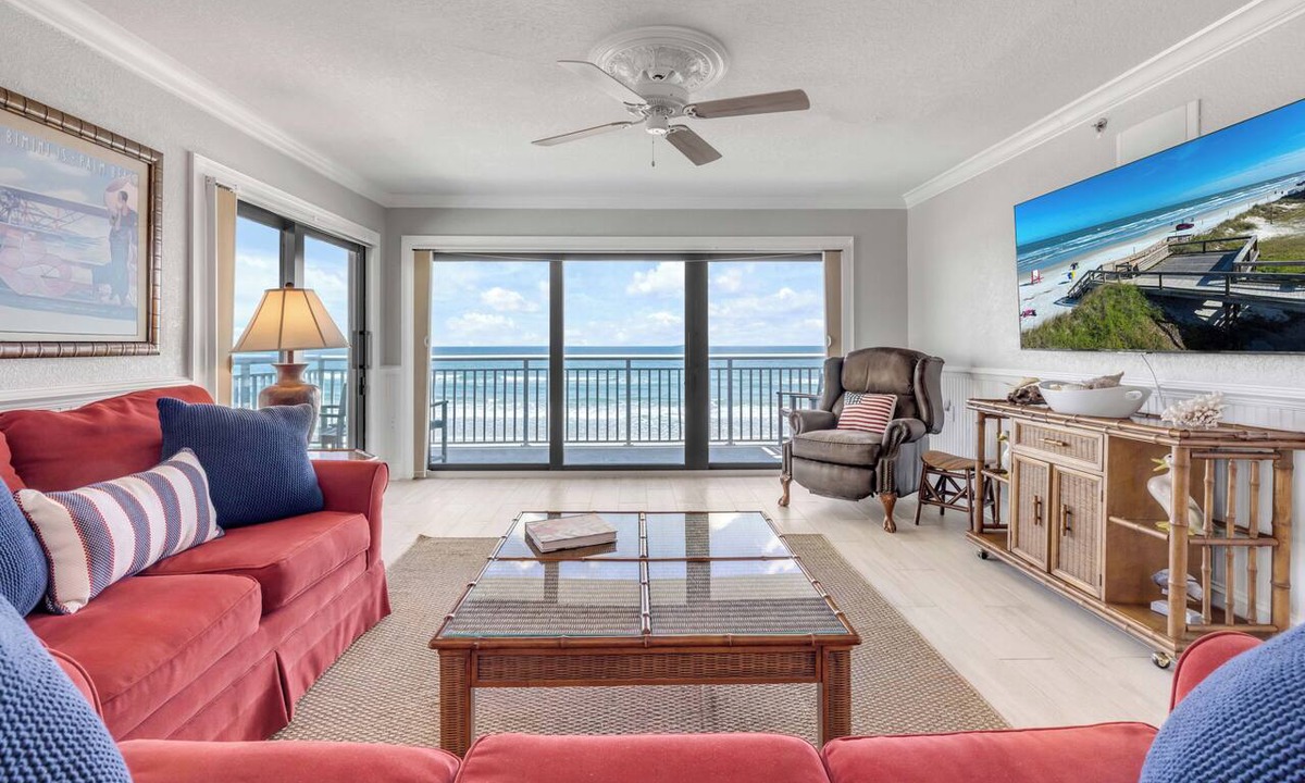 New Smyrna Beach Condo | Direct oceanfront corner 3/2 with a large wrap around balcony and heated pool