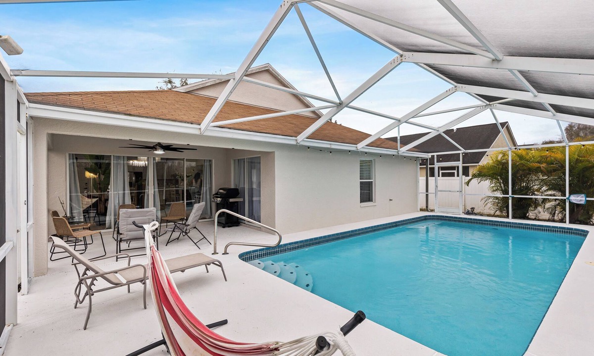 Oak Grove House | Escape to Florida Luxury – Lake View Pool Home in Lutz!