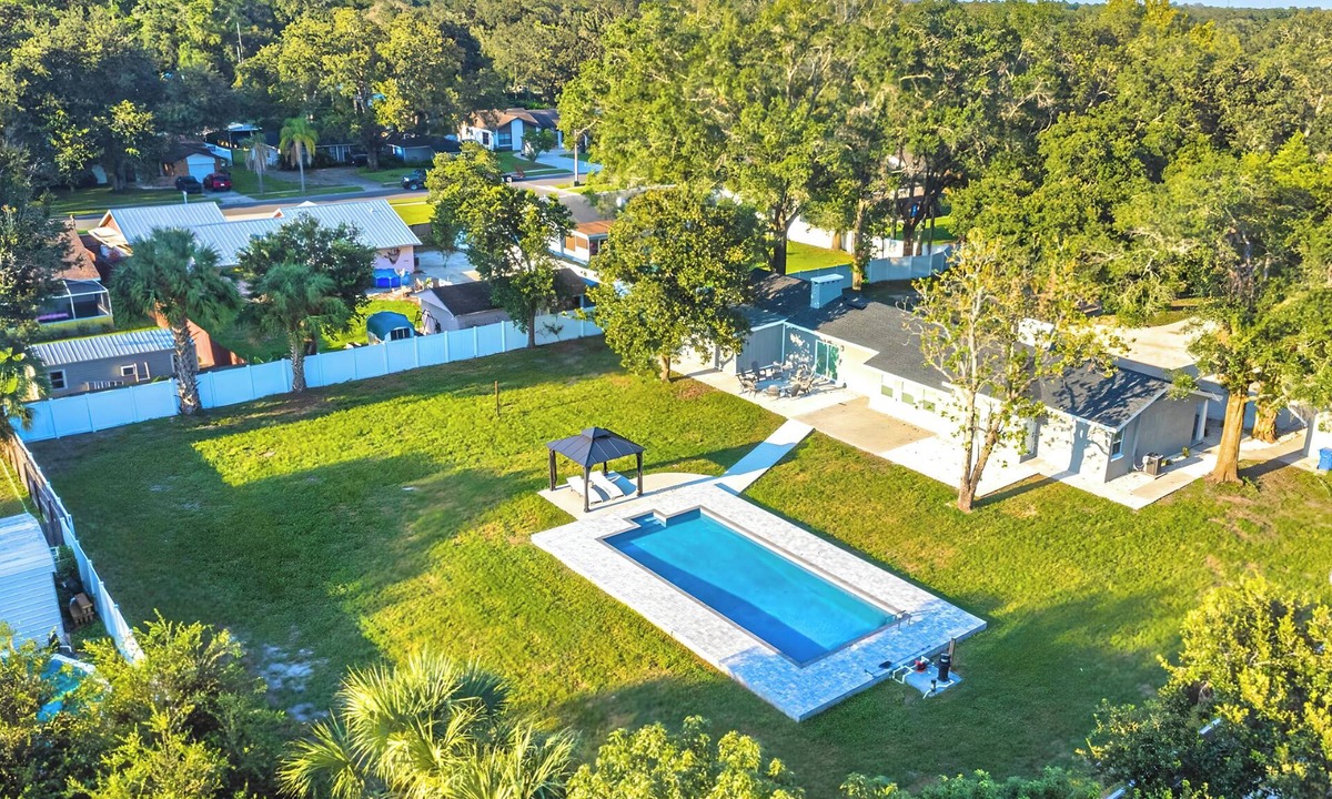 Bearss Plaza Villa | Exclusive Resort-Style Villa – Luxury Pool Retreat, Sleep 26+ Guests