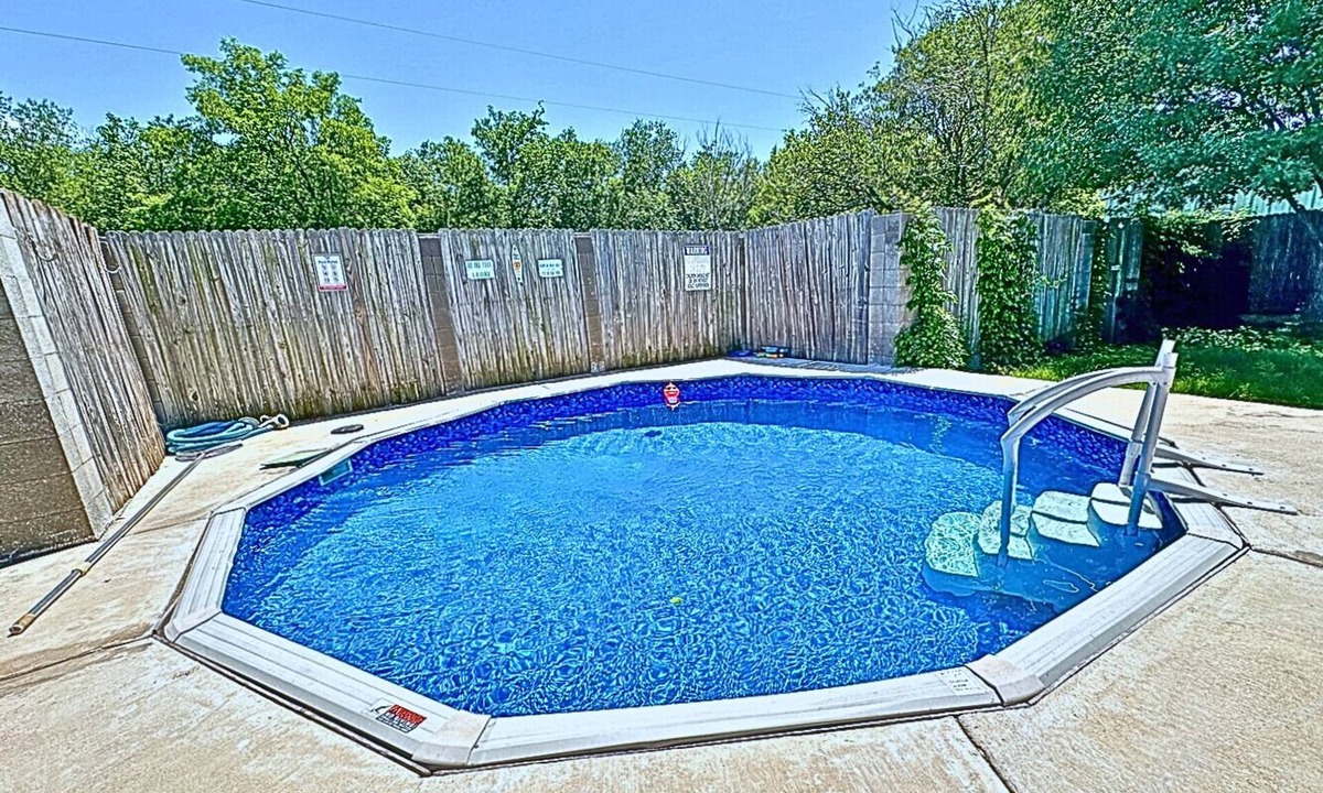 Keller House | Fort Worth Home near TX Speedway | Arcade Ping-Pong Game Room | Shared Pool Area