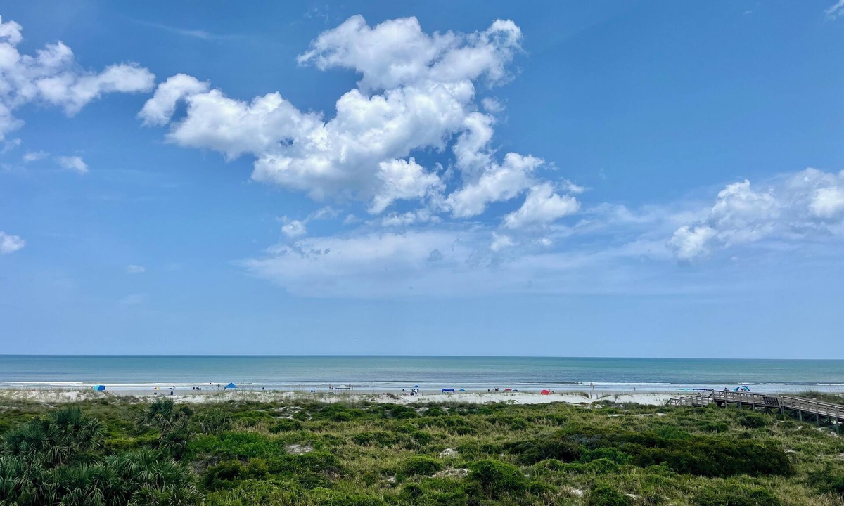 Butler Beach Condo | FREE FUN EVERYDAY! Beautiful corner unit with breathtaking views of the Atlantic Ocean.