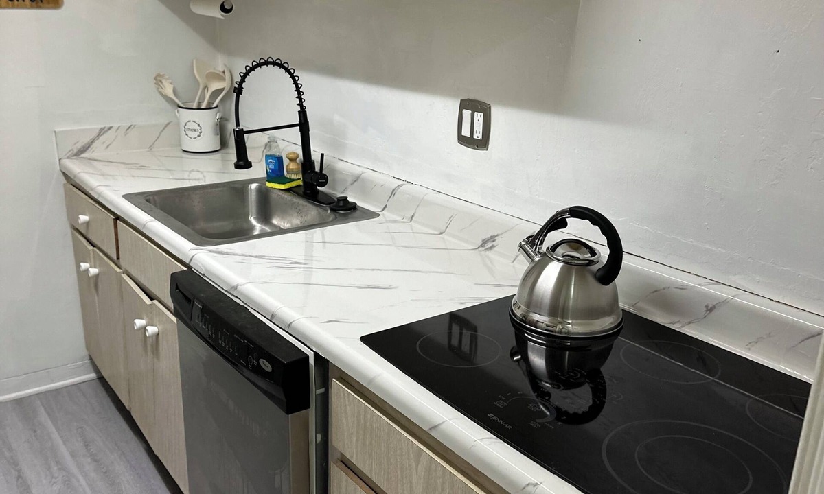 Sea Park Homes Condo | Gorgeous 1-bedroom condo close to work and play only steps to beach