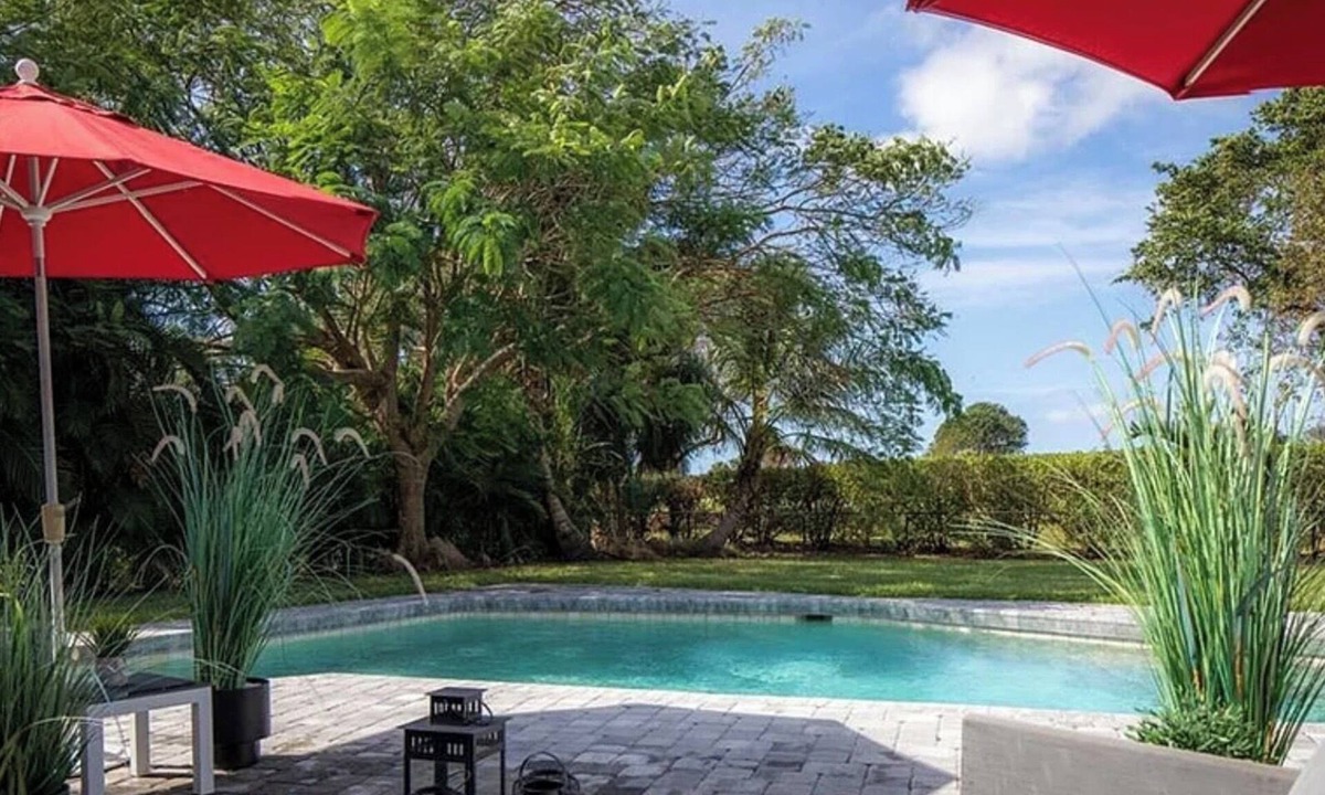 Palm River Estates House | Heated Pool - Tranquil & Private 4-bedroom house in Naples Sleeps 14