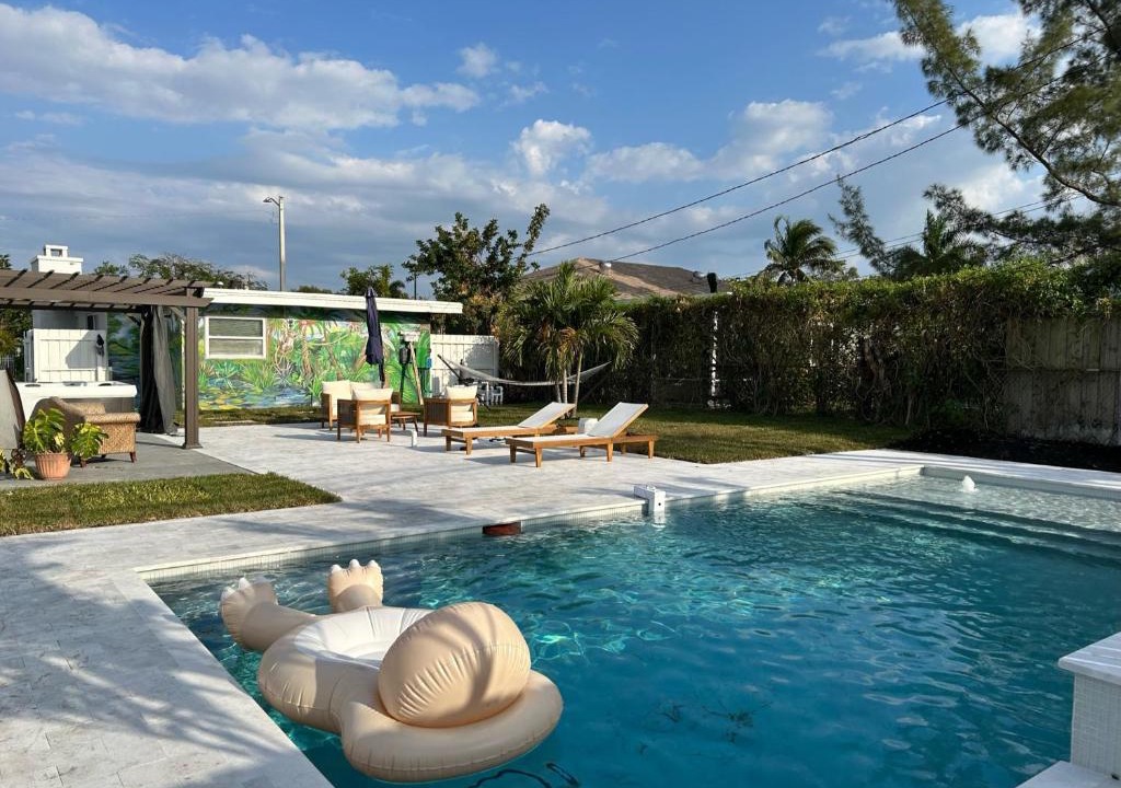 Lake Worth House | Jungle Cottage with luxury pool, hot tub and more!