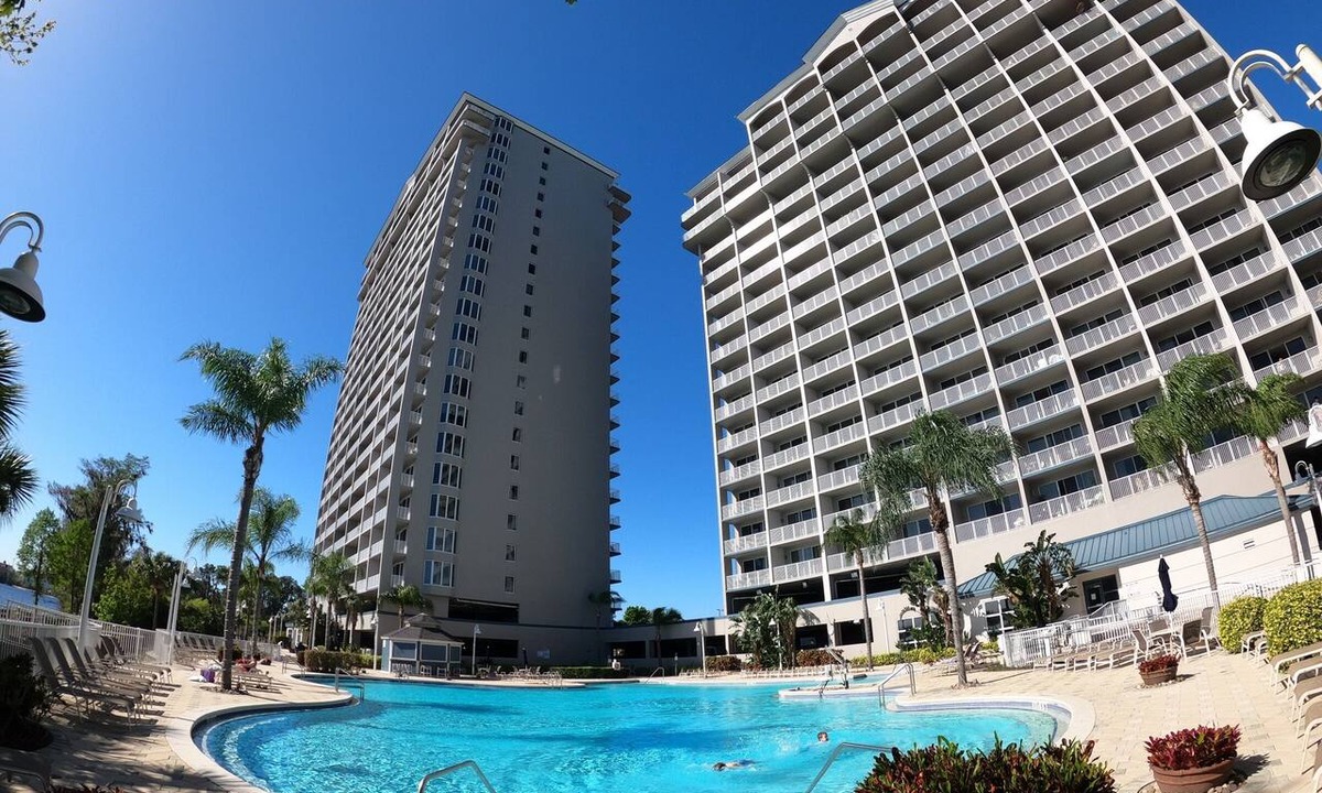 Florida Central Atlantic Coast Condo | Lakefront 885 sf CONDO just 1 mile to DISNEY with Balcony & 2 Resort POOLS & SPA