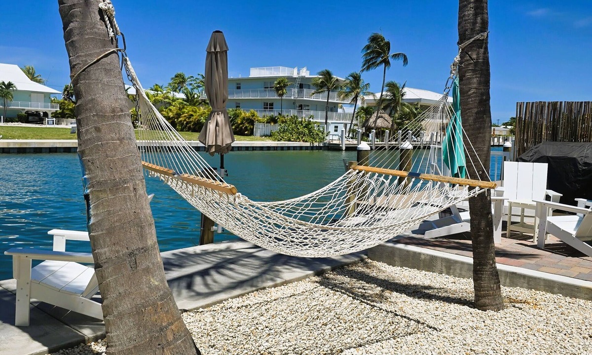 Key Colony Beach House | Latitude 24! Cabana Club access, deep canal, jacuzzi, kayaks, ice machine.