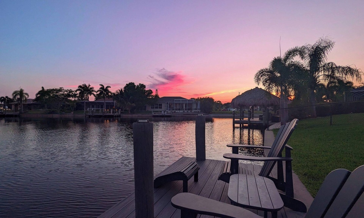 Cape Coral House | Luxury south facing waterfront home with heated salt pool and spa!