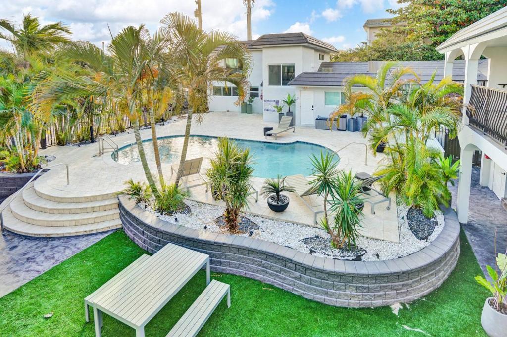 Almont Apartment | Modern 1BR Beach Stay | Heated Pool + Parking