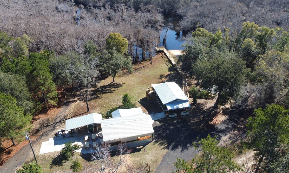 Bristol Cottage | New listing! Waterfront with dock, boat ramp! Surrounded by tupelo & cypress!