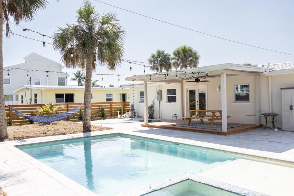 Mid Island House | Point Break! Walk to Beach - Cozy Beach Family Cottage with Pool