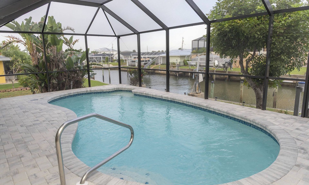 Englewood South House | Pool + Waterfront + No Bridge Gulf Access + Dock + 3 Bedrooms, 4 beds, 1 sofabed