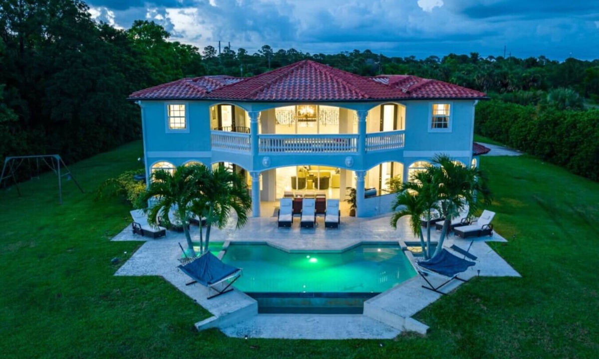 Palm City House | Private 5000 SF Waterfront Mansion w/Pool & Games