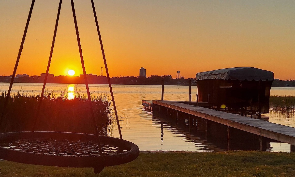 Winter Haven Apartment | Serene, Cozy, Lakefront Home with boat dock and Large Screened in porch!
