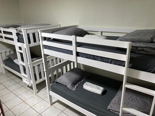Hialeah Hostel | Single Size BOTTOM Bunk Bed - Mixed Shared ROOM