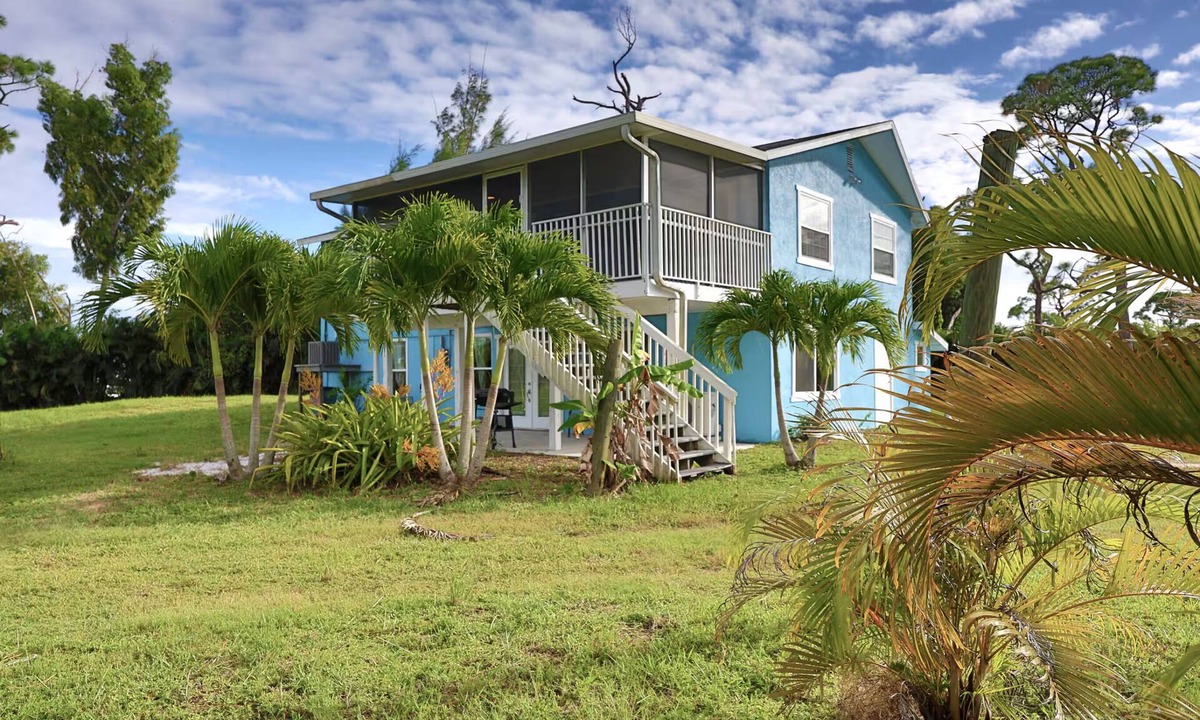 Saint James City House | Spacious 2-bedroom upstairs unit in a house surrounded by nature in Pine island