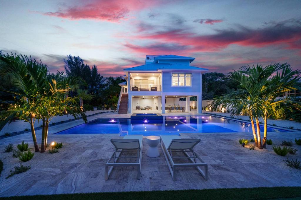 Anna Maria House | The Willow Inn: Huge Pool, Game Room, One Block to Beach by Anna Maria Life Vacation Rentals
