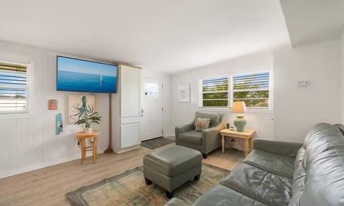 Laguna Beach House | This eclectic beach cottage is just a 3-minute walk to sugar-white sand and turquoise Gulf waters. Tucked in a quiet area yet close to the action, enjoy FREE Wi-Fi, Netflix, parking, coffee, and a private enclosed porch. 🌊✨