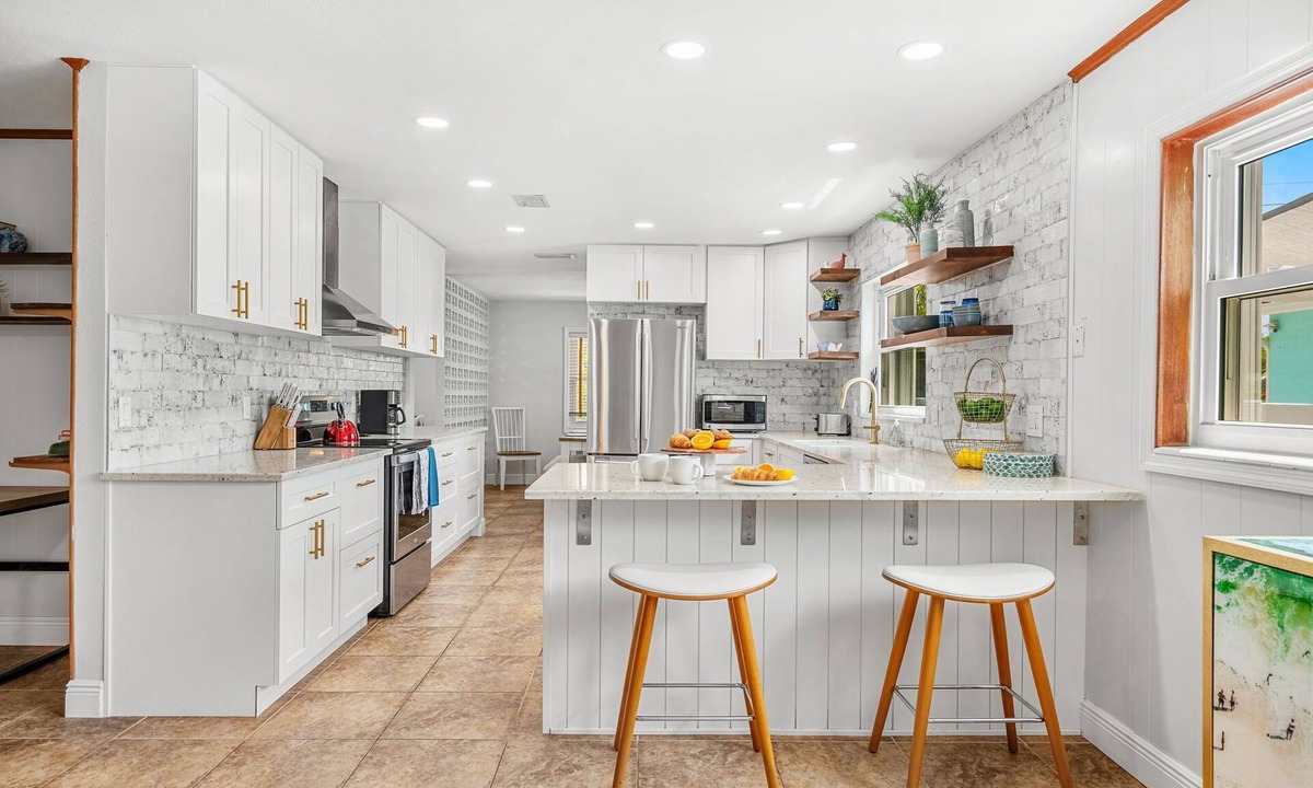 Seacoast Shores House | Tropical Retreat: Indian Harbour Beach Home with BBQ Grill, Fire Pit, Private Pool & Hot Tub! 🌴