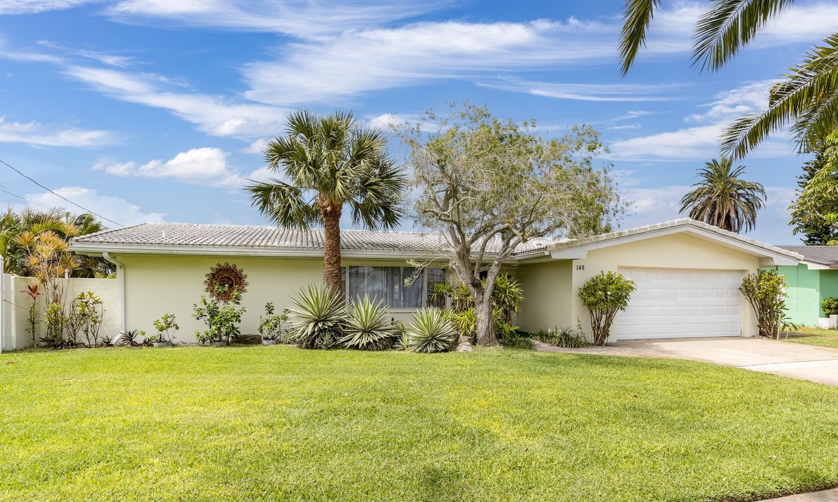 Cocoa Isles House | Vacation Rental Home -Near Beach, On a Canal with Pool - Great Location