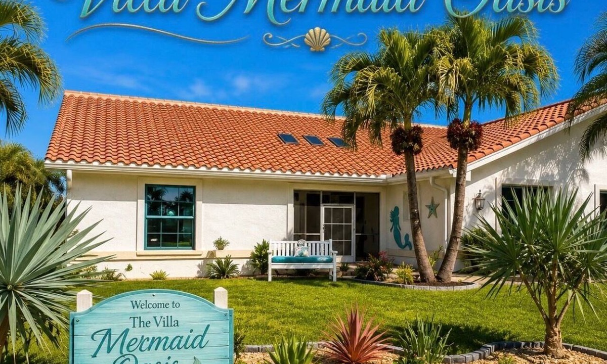 Town and River House | Villa Mermaid Oasis,Lakefront Paradise with 4BR/3BA, Spacious Layout Heated Pool