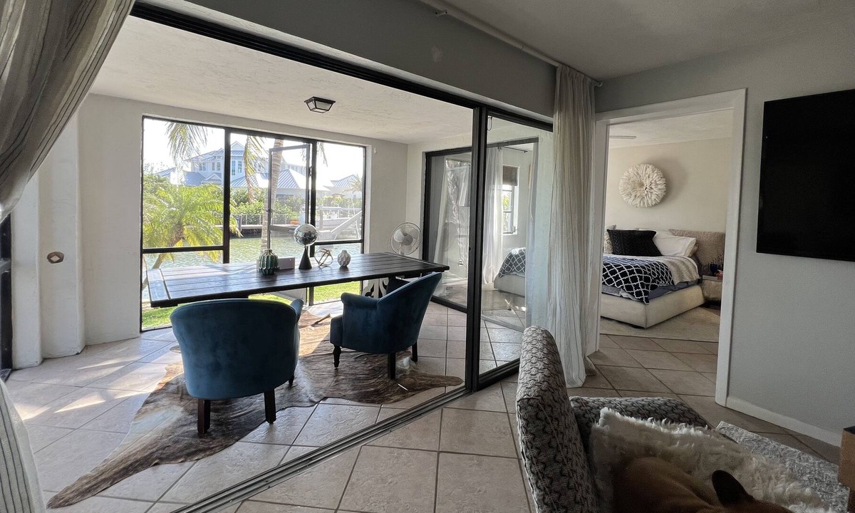 Royal Harbor Apartment | Watch the yachts roll on by, looking at the beautiful sunset sky