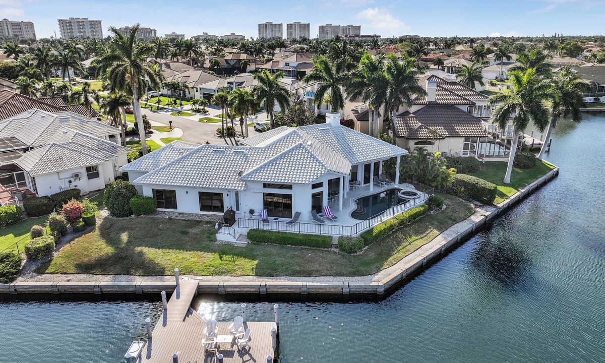 Marco Island House | Waterfront property with stunning views within walking distance to the beach.