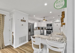 Beachside escape nestled between the ocean & river