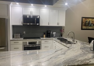 Luxury Shorewalk lakefront condo close to the AMI and IMG.