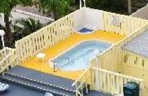 Barrier Island Condo | "1" 2 bed 2 bath condo 1 block off beach sleeps 8