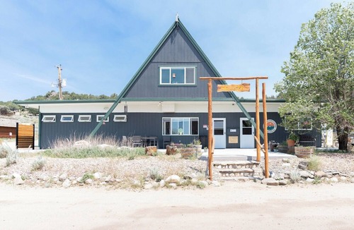 Buena Vista Cabin | 1 Room Dry Camping Cabin. Sleeps up to 4 in one queen bed and a set of twin bunks (bunk bed linens provided upon request).