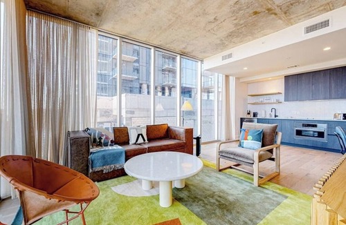 Rainey Street Historic District Condo | 13th floor corner condo, lake-view balcony, rooftop pool & gym, dog-friendly