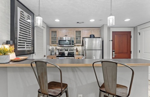 Baytowne Wharf Condo | 1BR Condo at Baytowne! Steps to Wharf, Tropical Pool & Hot Tub, Balcony View.