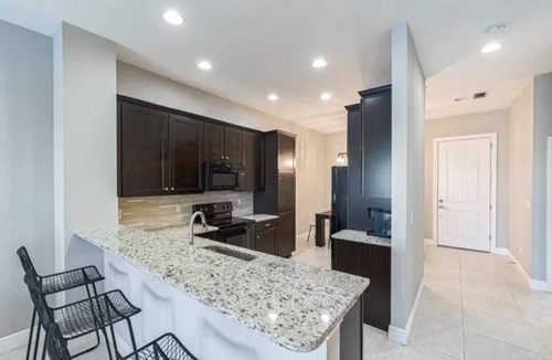 Naples Condo | 2 BR, 2 bath condo, den, lanai, pool, fitness room