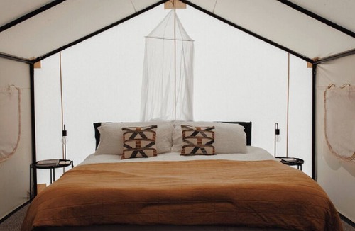 Canoncito RV Rental | 2 Person Glamping tent with one King Bed @ Field Trip NM .