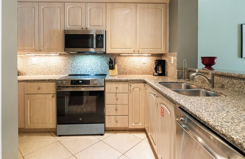 Rock Harbor House | 203 Mariners Club - This tri-level townhouse boasts 4 bedrooms and 3 baths
