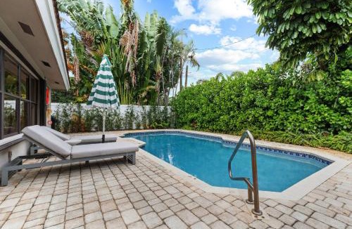 South Corals Villa | 25 min to FIFA - Bright Fort Lauderdale Villa with Private Heated Pool, Modern Décor and Palm-Lined Outdoor Oasis